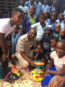 Lamin and His Family Donate Toys to Kids in Africa